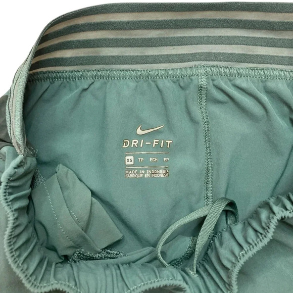 Nike Essential 7/8 Dri-Fit Pants in two-tone green size XS - Picture 5 of 7